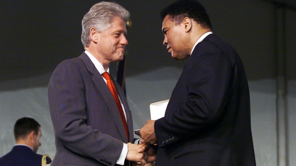 President Bill Clinton shakes hands with Muhammad Ali after presenting the former heavyweight champ with the Presidential Citizens Medals at the White House South Lawn Pavillion in Washington.