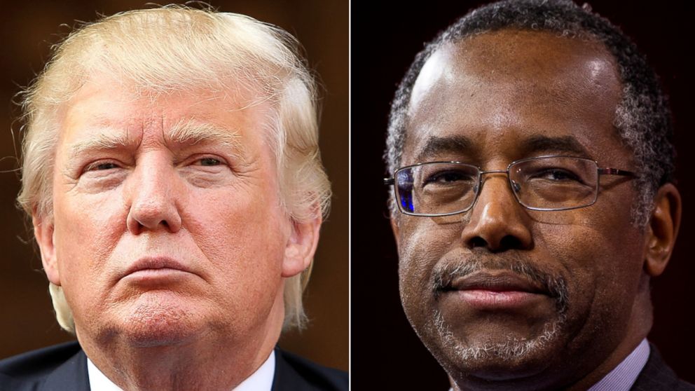 Donald Trump listens at the Trump International Hotel Groundbreaking Ceremony, July 23, 2014 in Washington.  Dr. Ben Carson speaks to address the crowd at CPAC in National Harbor, Md., Feb. 26, 2015. 