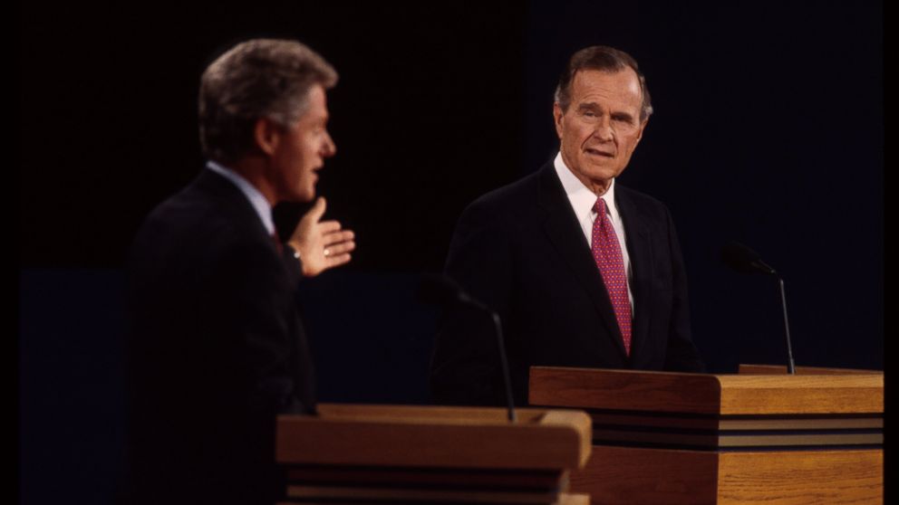 PHOTO: Bill Clinton and George H.W. bush are seen here at a presidential debate, Oct. 19, 1992, in East Lansing, Mich.