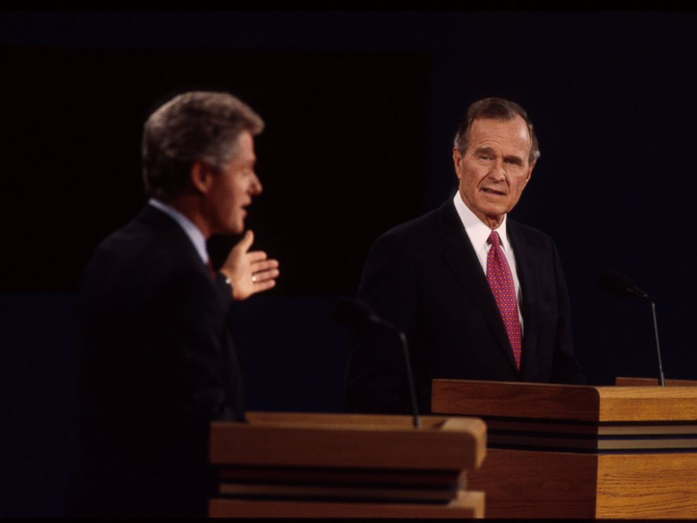 PHOTO: Bill Clinton and George H.W. bush are seen here at a presidential debate, Oct. 19, 1992, in East Lansing, Mich.
