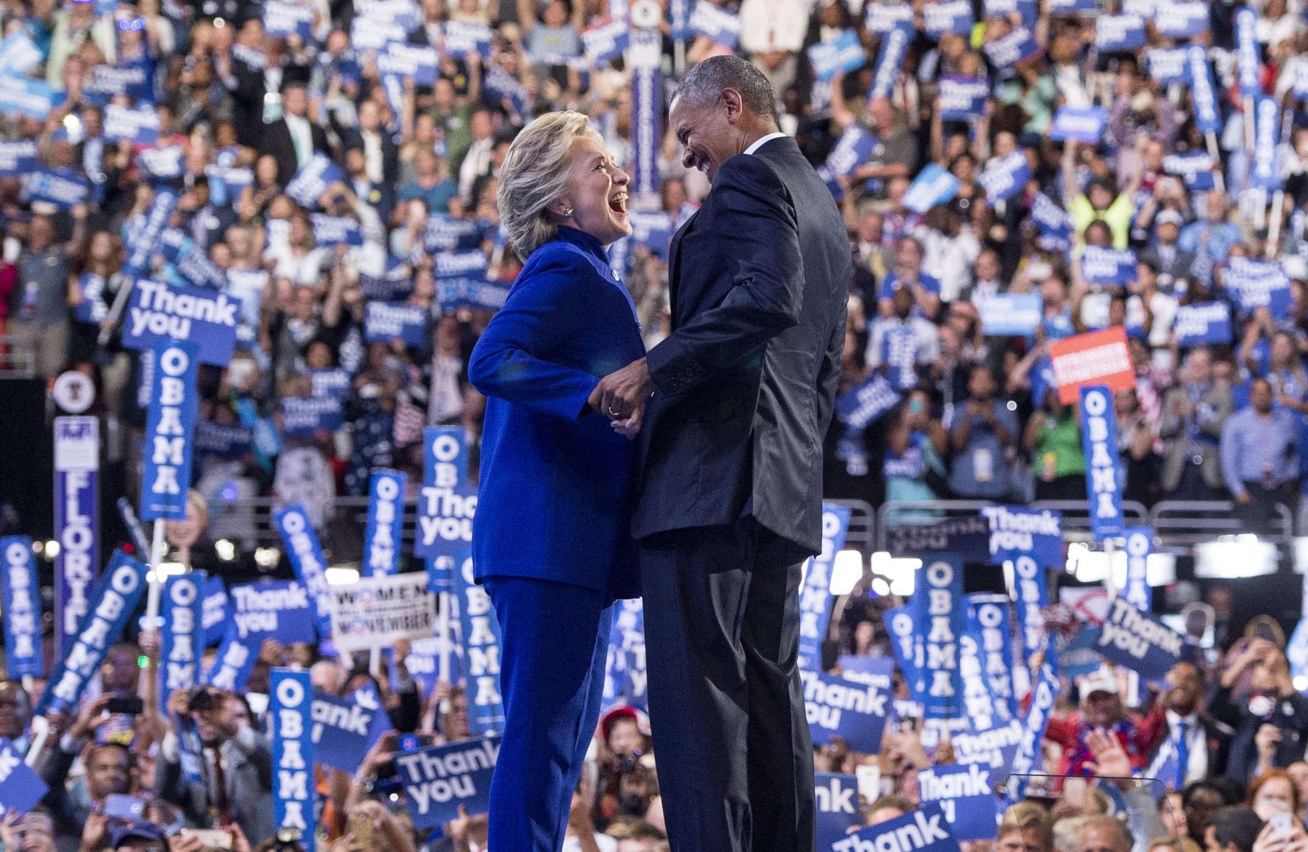 PHOTO: President Barack Obama is joined by US Democratic presidential candidate Hillary Clinton after his address to the Democratic National Convention at the Wells Fargo Center in Philadelphia, July 27, 2016.