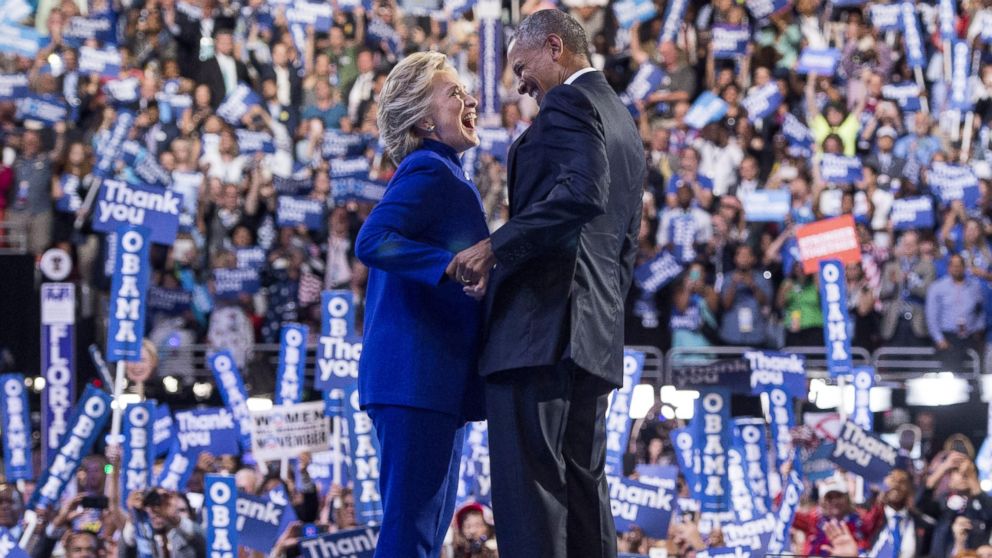 PHOTO: President Barack Obama is joined by US Democratic presidential candidate Hillary Clinton after his address to the Democratic National Convention at the Wells Fargo Center in Philadelphia, July 27, 2016.