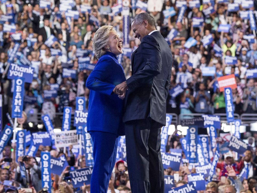 PHOTO: President Barack Obama is joined by US Democratic presidential candidate Hillary Clinton after his address to the Democratic National Convention at the Wells Fargo Center in Philadelphia, July 27, 2016.