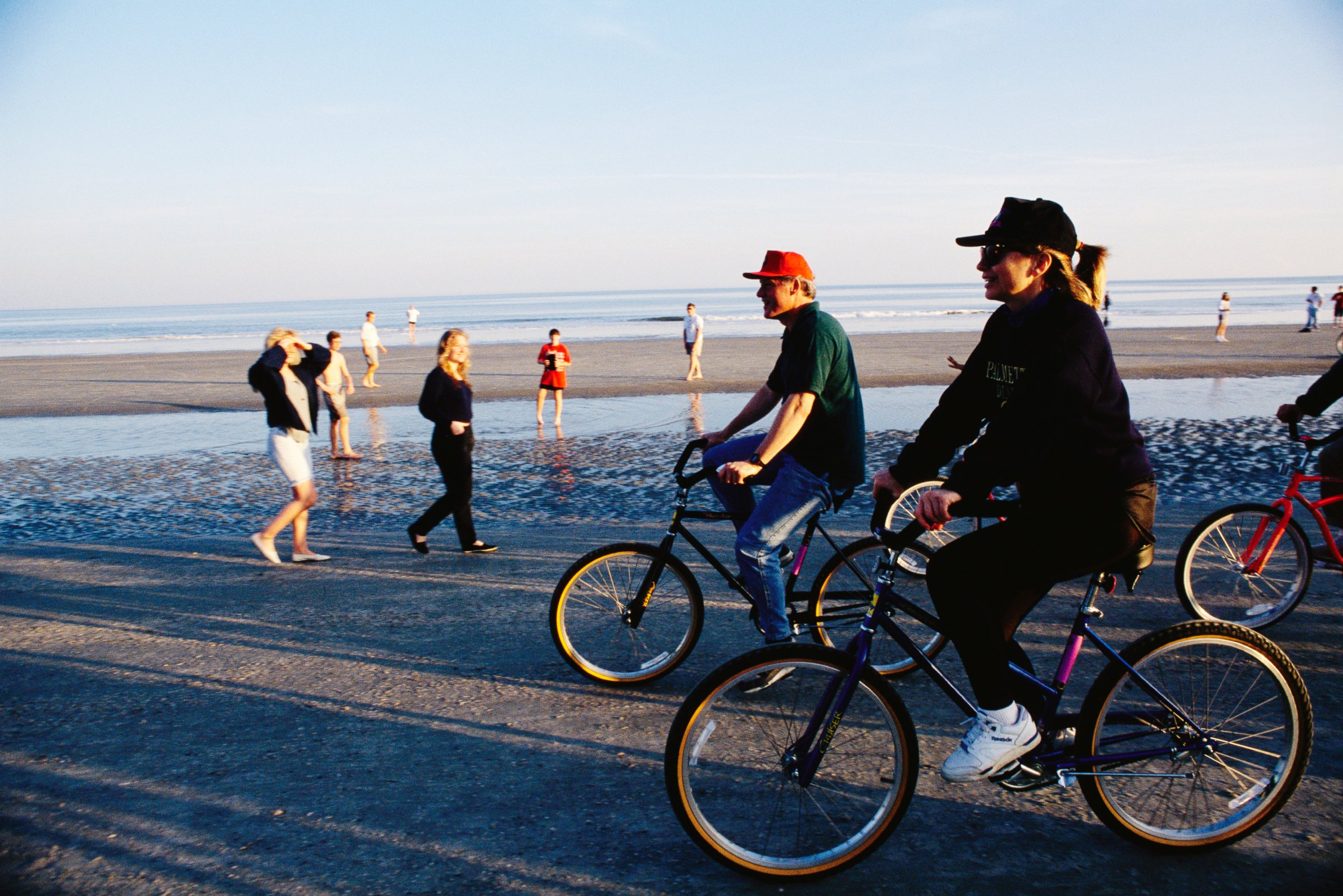 PHOTO:In this undated file photo Bill Clinton and Hillary Rodham Clinton ride bicycles along the beach at Hilton Head in South Carolina.