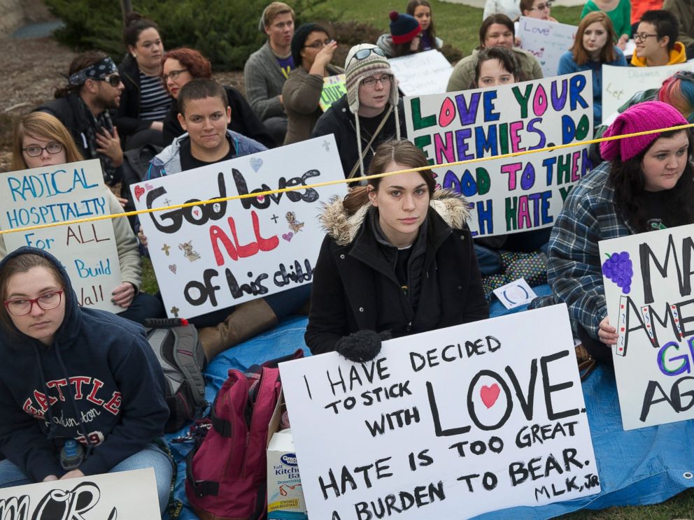 PHOTO: Demonstrators protests outside a campaign rally for Republican presidential candidate Donald Trump at St. Norbert College, March 30, 2016 in De Pere, Wisconsin.