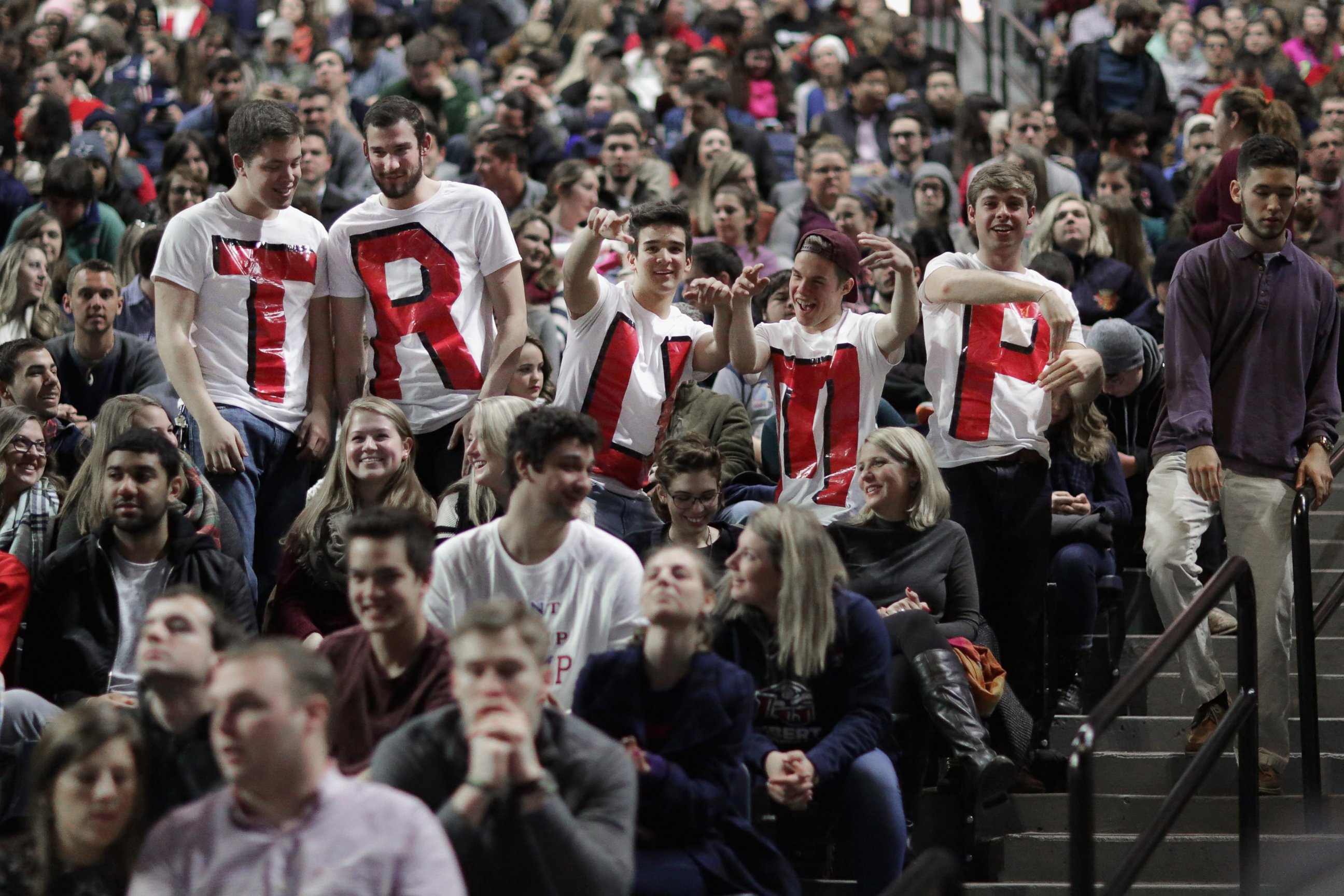 PHOTO: Liberty University students wear home made t-shirts spelling 'TRUMP' while waiting for the arrival of Republican presidential candidate Donald Trump during a campaign rally, Jan. 18, 2016 in Lynchburg, Virginia.