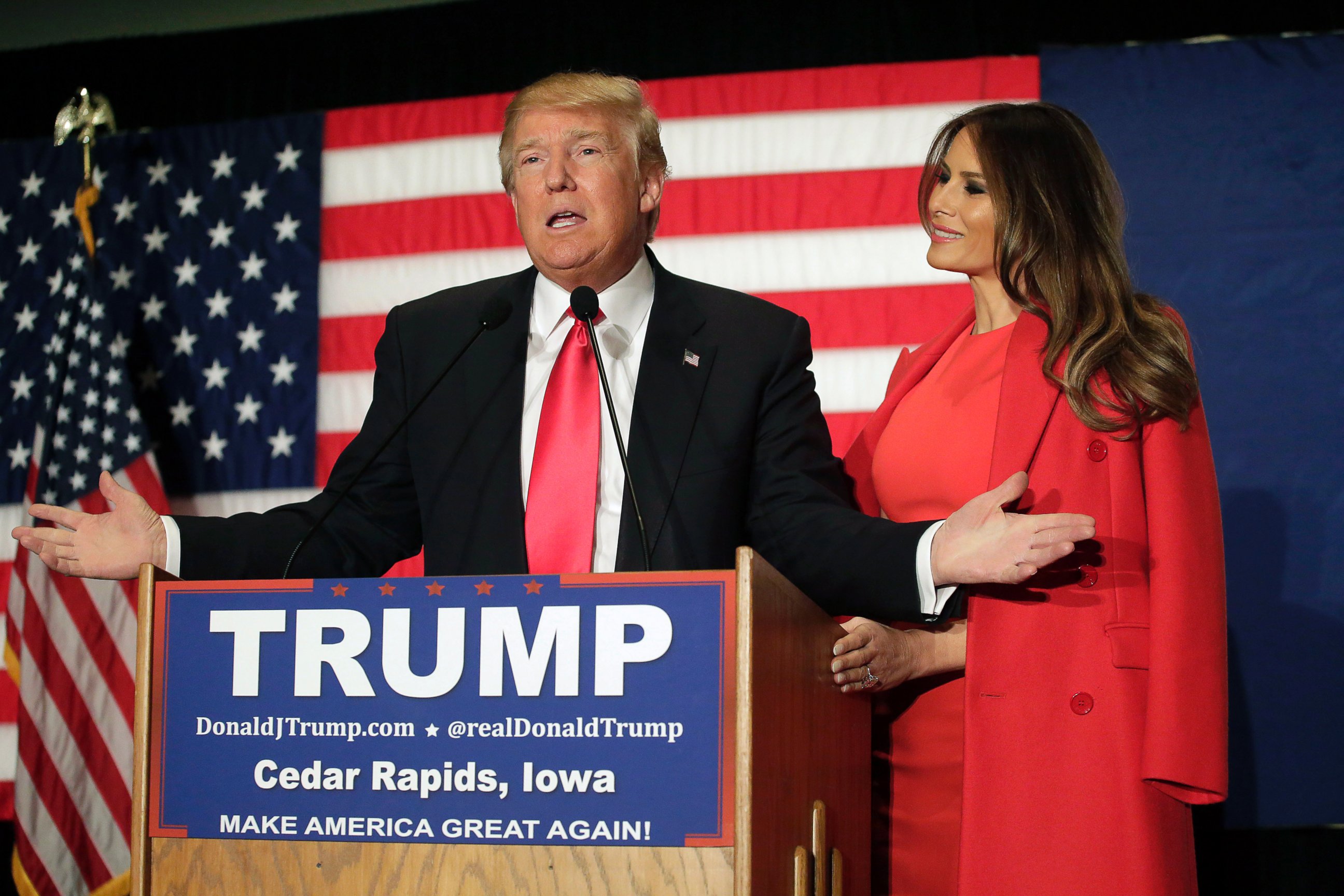 PHOTO: Republican presidential candidate Donald Trump speaks with his wife Melania Trump by his side during a campaign event at the U.S. Cellular Convention Center, Feb. 1, 2016 in Cedar Rapids, Iowa. 