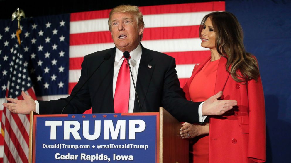 PHOTO: Republican presidential candidate Donald Trump speaks with his wife Melania Trump by his side during a campaign event at the U.S. Cellular Convention Center, Feb. 1, 2016 in Cedar Rapids, Iowa. 