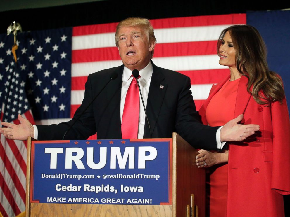 PHOTO: Republican presidential candidate Donald Trump speaks with his wife Melania Trump by his side during a campaign event at the U.S. Cellular Convention Center, Feb. 1, 2016 in Cedar Rapids, Iowa.