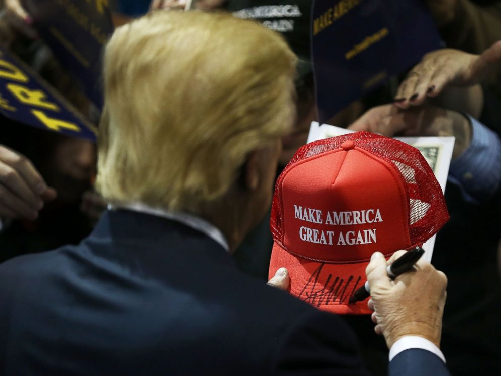PHOTO:Donald Trump signs one of his campaign hats during a event at the University of Northern Iowa, Jan. 12, 2016, in Cedar Falls, Iowa.