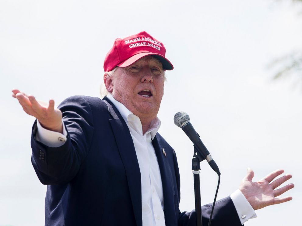 PHOTO: Republican presidential candidate businessman Donald Trump speaks with reporters after arriving at the Iowa State Fair on Aug. 15, 2015 in Des Moines, Iowa.