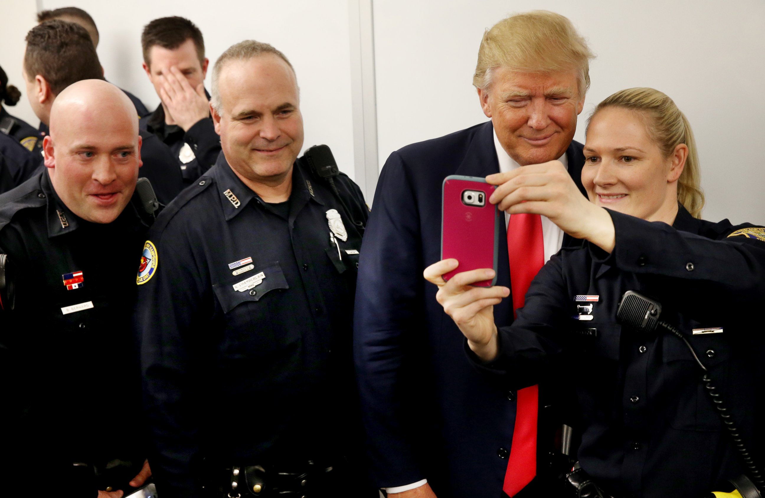 PHOTO: Officer Shannon Jackson, right, takes a selfie with Donald Trump while while the candidate visited the Manchester Police Department in Manchester, New Hampshire, on Feb. 4, 2016. 