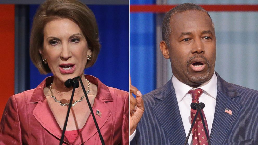 Carly Fiorina, left, is pictured on Aug. 6, 2015 in Cleveland, Ohio. Ben Carson, right, are pictured on Aug. 6, 2015 in Cleveland, Ohio. 