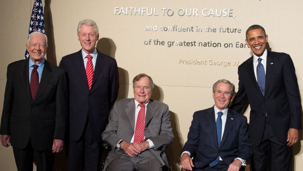 From left, Jimmy Carter, Bill Clinton, George H.W. Bush, George W. Bush, and Barack Obama pose at the opening of the George W. Bush Presidential Center on April 25, 2013 in Dallas, Texas.  