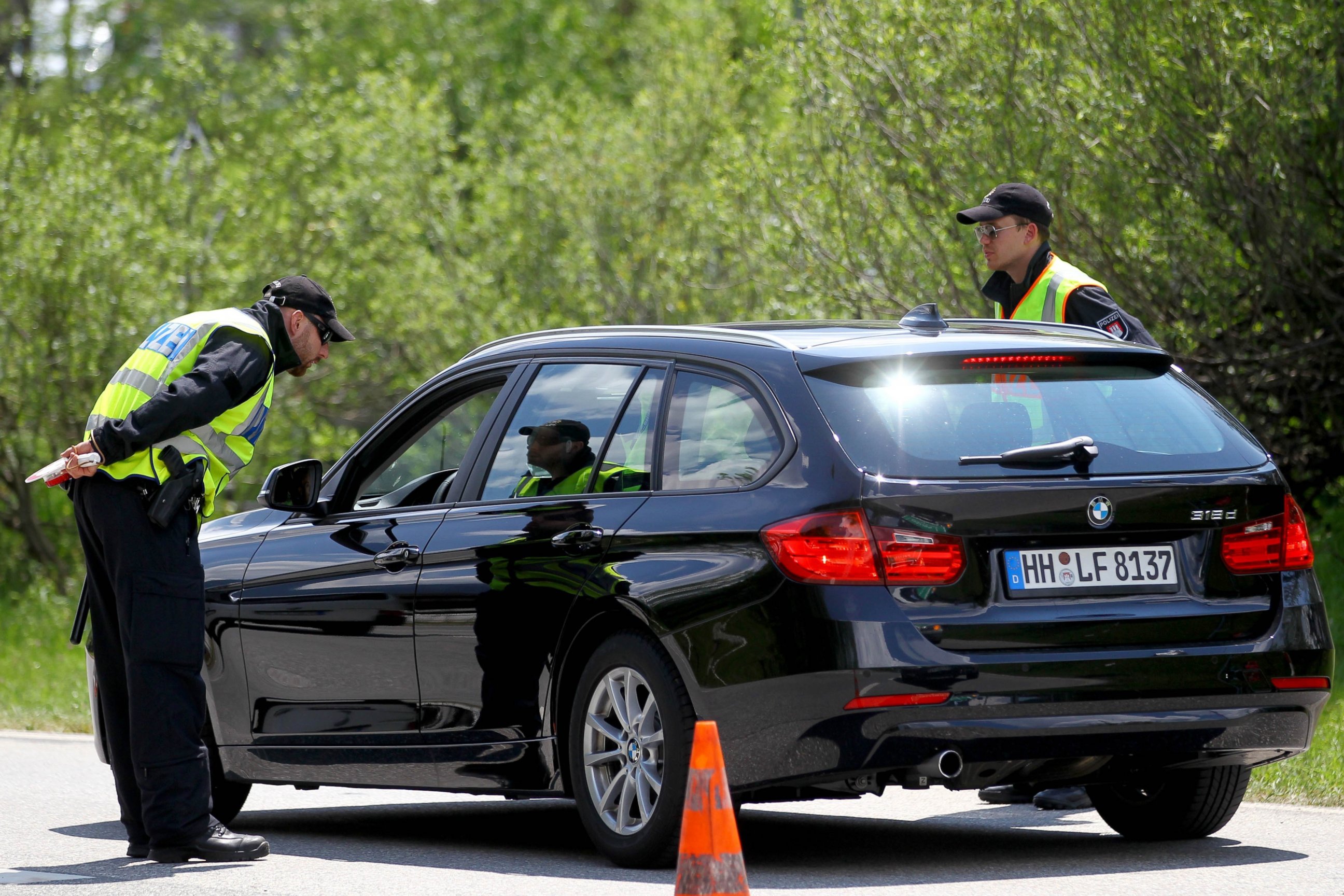 PHOTO: Police officers stop a car on a road a day before the G7 Summit in Krun, Germany on June 6, 2015. 
