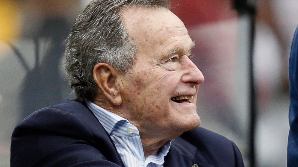 PHOTO: Former President George H.W. Bush at Reliant Stadium as the Oakland Raiders play the Houston Texans in Houston, Nov. 17, 2013.