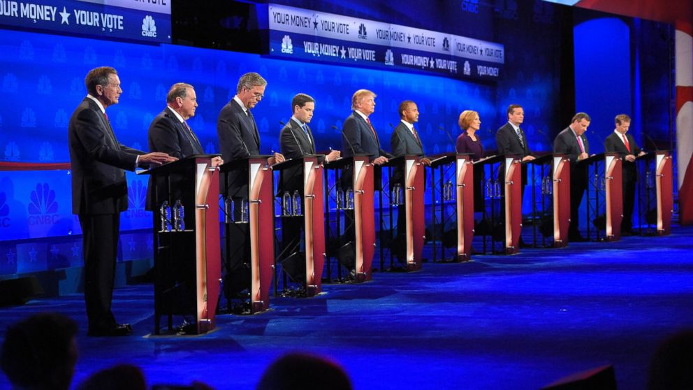 Republican presidential candidates, from left, John Kasich, Mike Huckabee, Jeb Bush, Marco Rubio, Donald Trump, Ben Carson, Carly Fiorina, Ted Cruz, Chris Christie, and Rand Paul take the stage during the CNBC Republican presidential debate at the University of Colo., Oct. 28, 2015, in Boulder, Colo. 