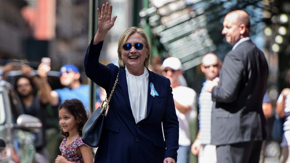 PHOTO: Democratic presidential nominee Hillary Clinton waves to the press as she leaves her daughter's apartment building after resting on Sept. 11, 2016, in New York.
