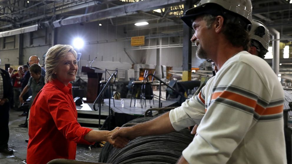 Democratic presidential nominee former Secretary of State Hillary Clinton greets steel workers during a campaign rally with democratic vice presidential nominee Sen Tim Kaine at Johnstown Wire Technologies, July 30, 2016 in Johnstown, Pennsylvania.