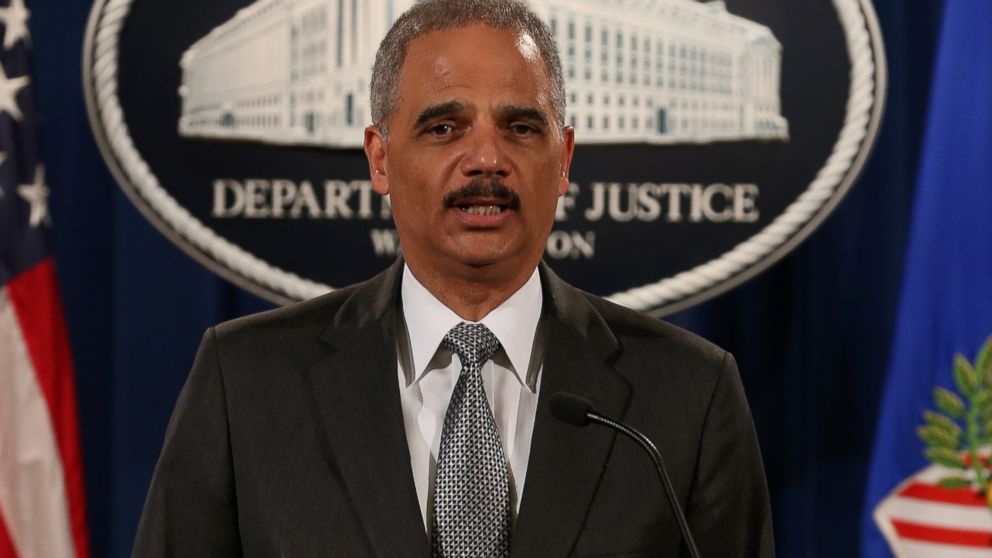 PHOTO: Eric Holder speaks at the Justice Department on Dec. 3, 2014 in Washington, D.C. 