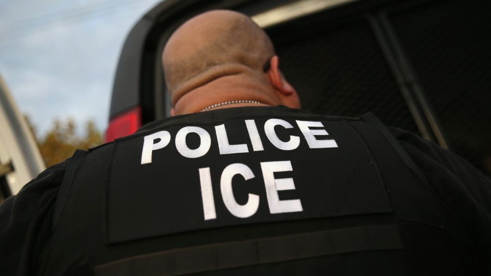 U.S. Immigration and Customs Enforcement (ICE) agents detain an immigrant, Oct. 14, 2015 in Los Angeles. 