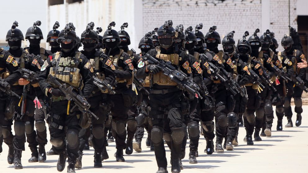 In this June 19, 2013 file photo, Iraqi special forces take part in a drill simulating a hostage rescue operation at an Iraqi army base North of Baghdad. 