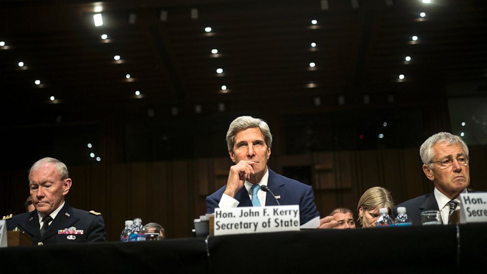 From left, Chairman of the Joint Chiefs of Staff US Army General Martin E. Dempsey, US Secretary of State John Kerry and US Secretary of Defense Chuck Hagel listen during a hearing of the Senate Foreign Relations Committee on Capitol Hill, Sept. 3, 2013 in Washington.