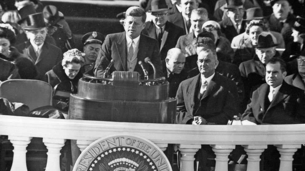 PHOTO: John F. Kennedy delivers his inauguration address, Jan. 20, 1961. Seated behind him are Lyndon B. Johnson and Richard Nixon, the man he defeated.