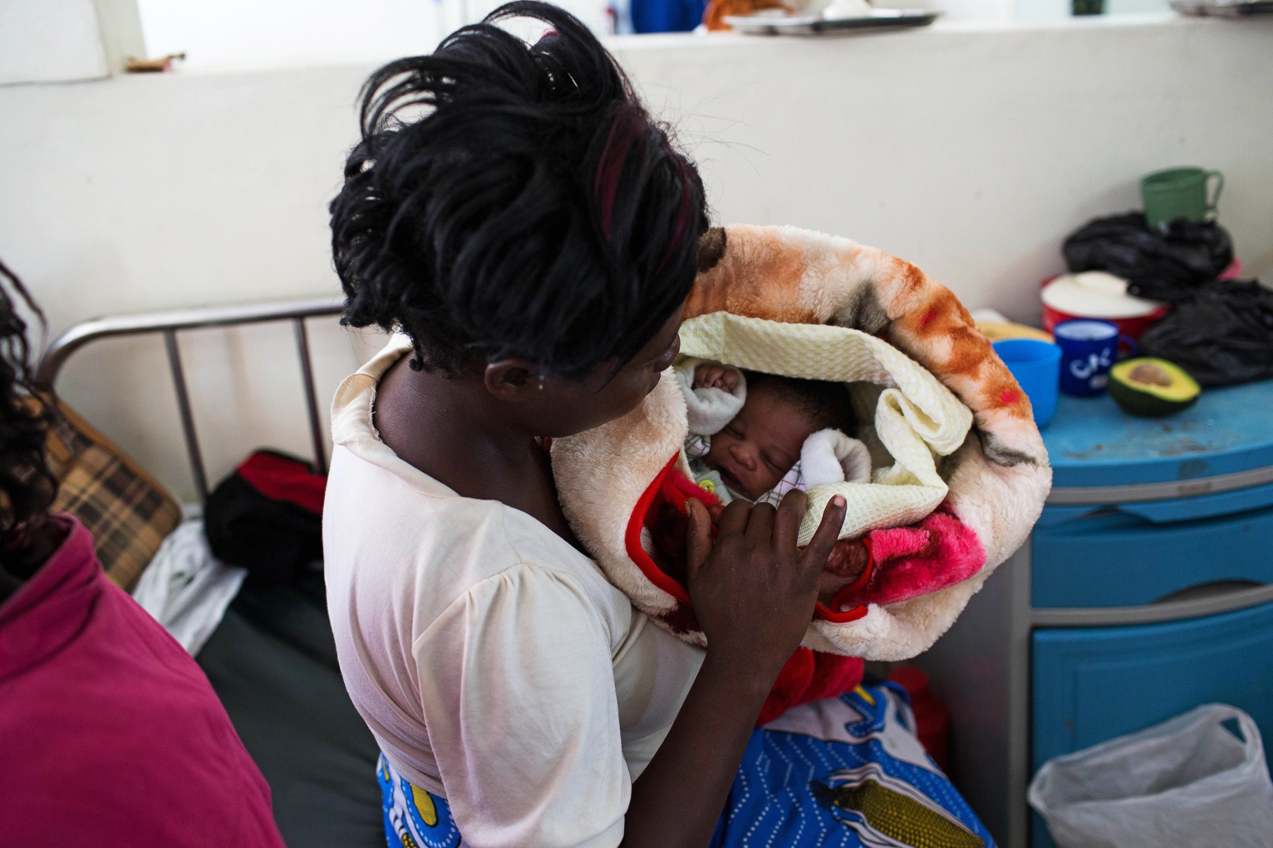 PHOTO: Lucia Kagotha holds her new born baby boy, named 'Obama' in honour of the President Barack Obama, at the Mbagathi Hospital of Nairobi on July 26, 2015. 