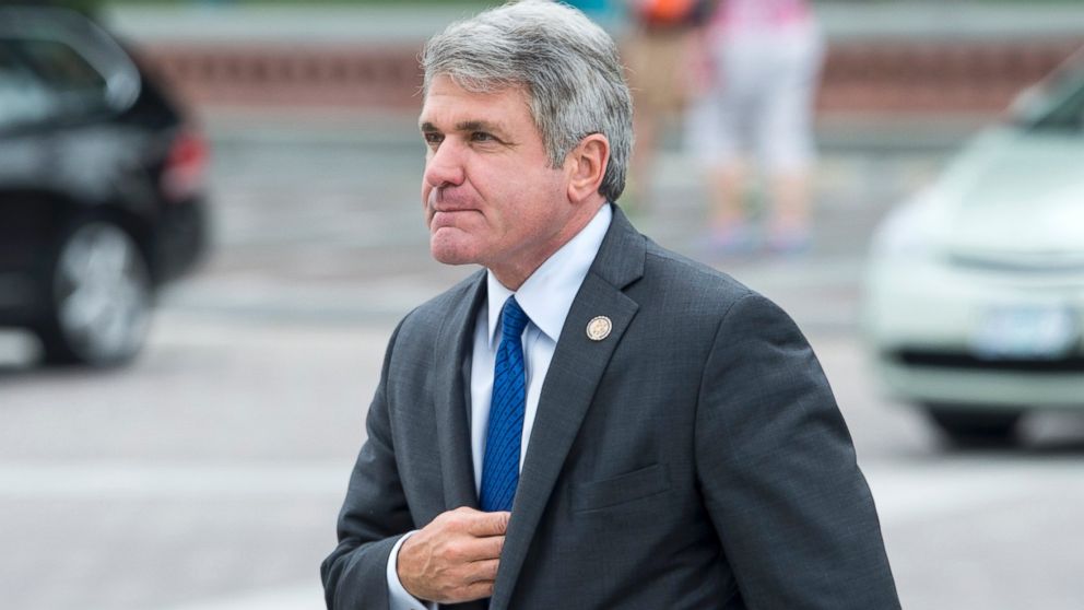 Rep. Michael McCaul, R-Texas, heads to the House floor for a vote, July 24, 2014.
