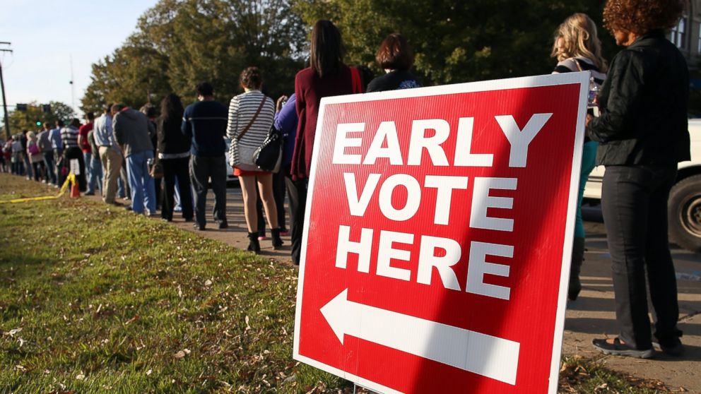 People line up for early voting outside of the Pulaski County Regional Building, Nov. 3, 2014 in Little Rock, Ark.