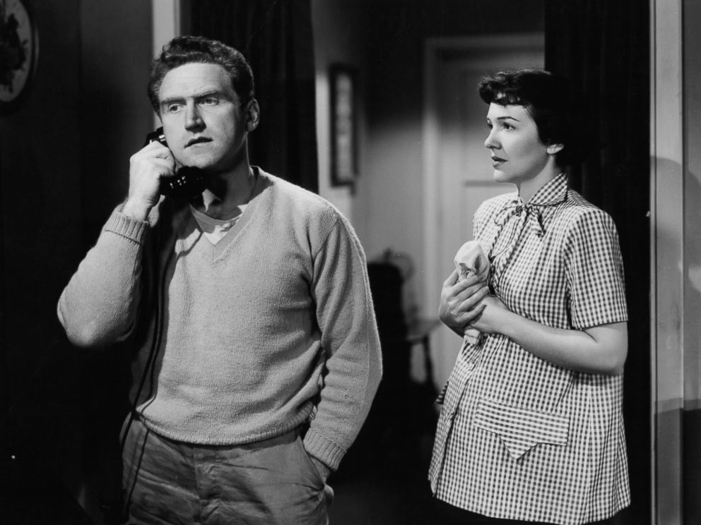 PHOTO:James Whitmore on the phone as Nancy Davis watches in a scene from the film The Next Voice You Hear..., 1950.