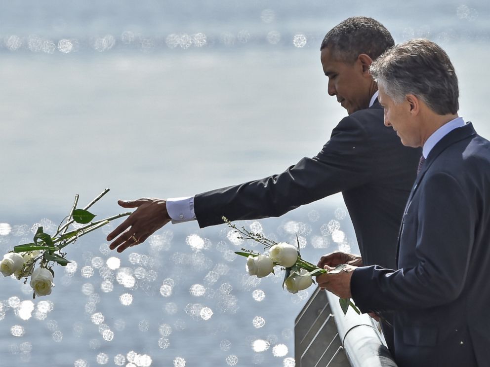 PHOTO:President Obama and Argentinian President Mauricio Macri throw white flowers into the River as they pay homage to Dirty Wars victims at the Parque de la Memoria in Buenos Aires, March 24, on the 40th anniversary of the 1976 military coup.