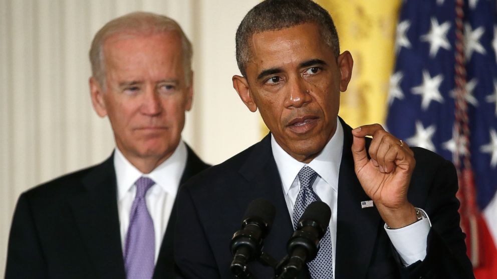 Barack Obama, right, speaks with Joe Biden, left, at the launch of the "It's On Us" campaign, a public awareness campaign to help prevent campus sexual assault, during an event at the White House on Sept. 19, 2014 in Washington, D.C.