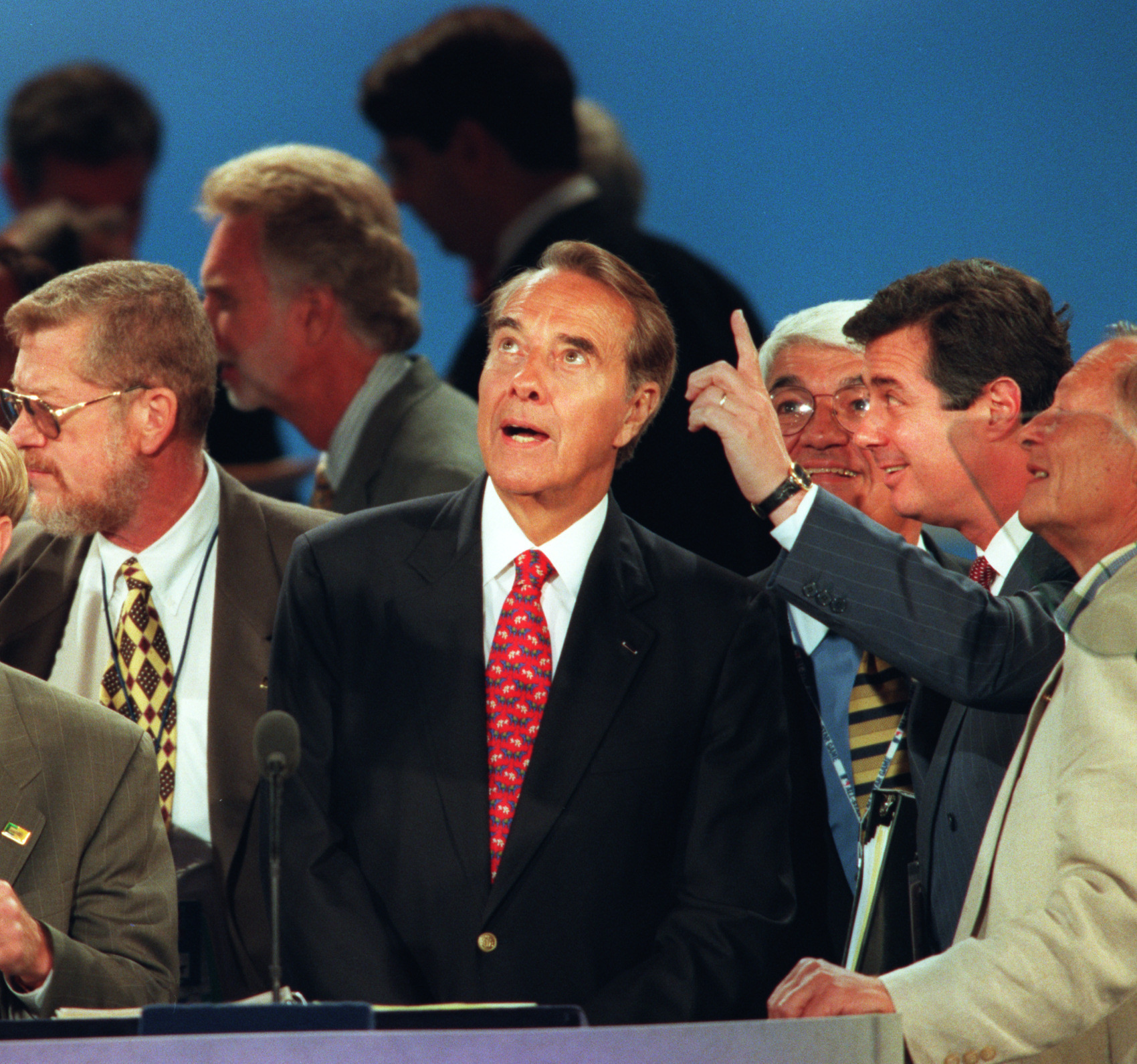 PHOTO: Republican presidential candidate Bob Dole looks up from the podium as convention center manager Paul Manafort, at right, points out preparations for Dole's acceptance speech in San Diego, Aug. 15, 1996. 