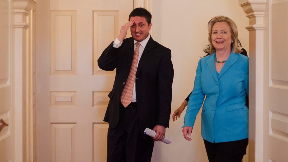 Philippe I. Reines is pictured with Secretary of State Hillary Clinton as she arrives to be interviewed by Katie Couric in Washington, May 19, 2011. 