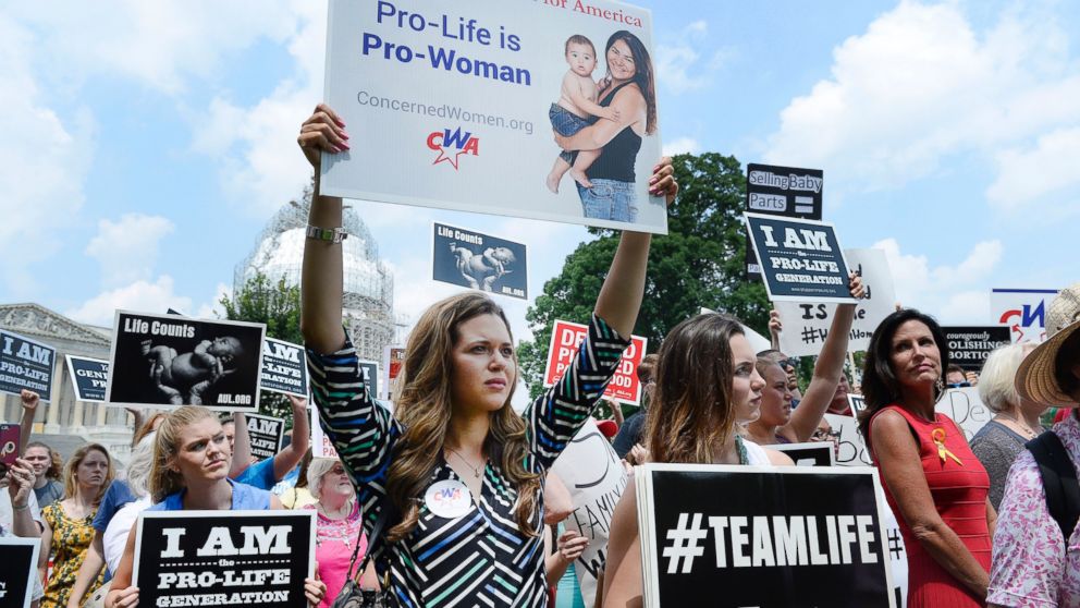 Anti-abortion activists hold a rally opposing federal funding for Planned Parenthood in front of the U.S. Capitol on July 28, 2015 in Washington. 