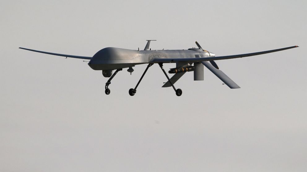 A U.S. Air Force MQ-1B Predator unmanned aerial vehicle (UAV), carrying a Hellfire missile lands at a secret air base after flying a mission in the Persian Gulf region, Jan. 7, 2016.