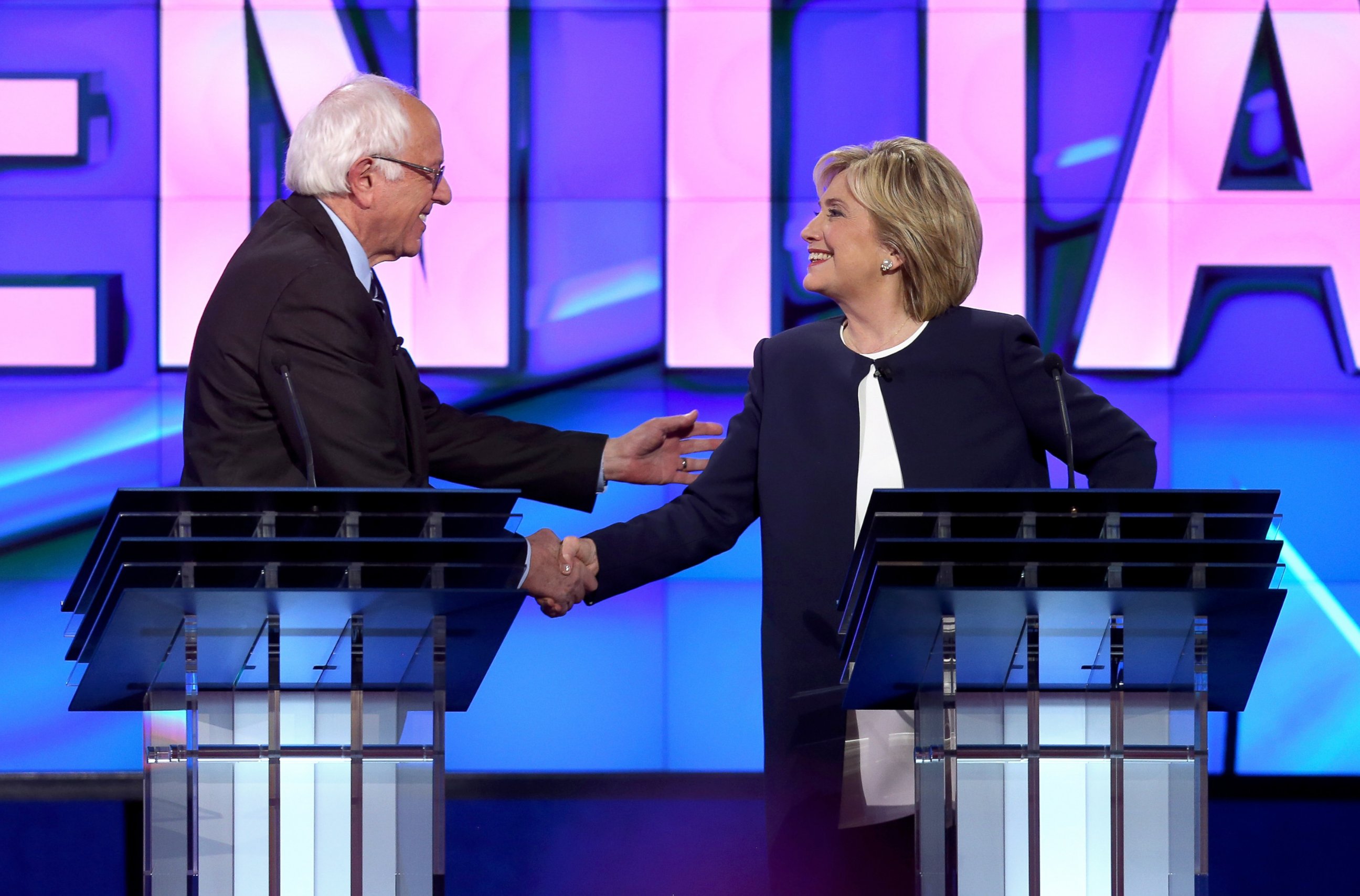 PHOTO: Democratic presidential candidates Sen. Bernie Sanders and Hillary Clinton shake hands at the end of a presidential debate at Wynn Las Vegas, Oct. 13, 2015 in Las Vegas.