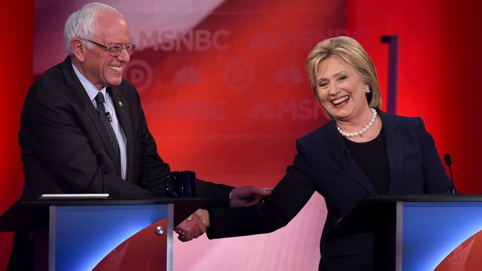Hillary Clinton and Bernie Sanders shake hands as they participate in the MSNBC Democratic Candidates Debate at the University of New Hampshire in Durham, Feb. 4, 2016. 