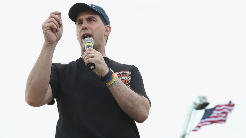 Republican presidential hopeful Wisconsin Governor Scott Walker speaks at a Roast and Ride event hosted by freshman Senator Joni Ernst, R-IA, on June 6, 2015 in Boone, Iowa.
