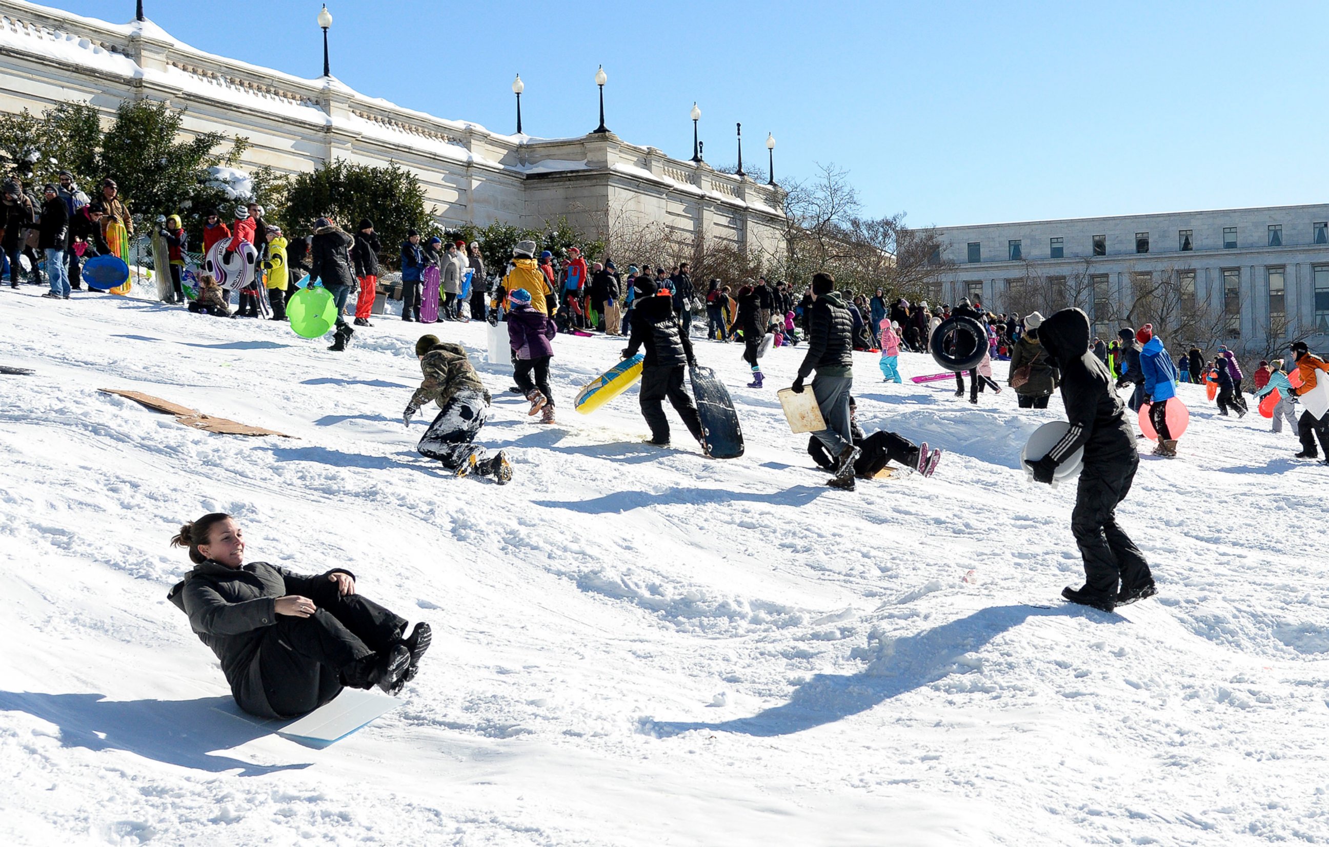 PHOTO: People are sliding on the West Lawn of the U.S. Capitol, Jan. 24, 2016 in Washington.