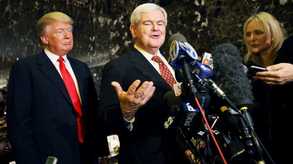 Speaker of the House Newt Gingrich speaks to the media as Donald Trump listens at Trump Tower, Dec. 5, 2011, in New York City. 