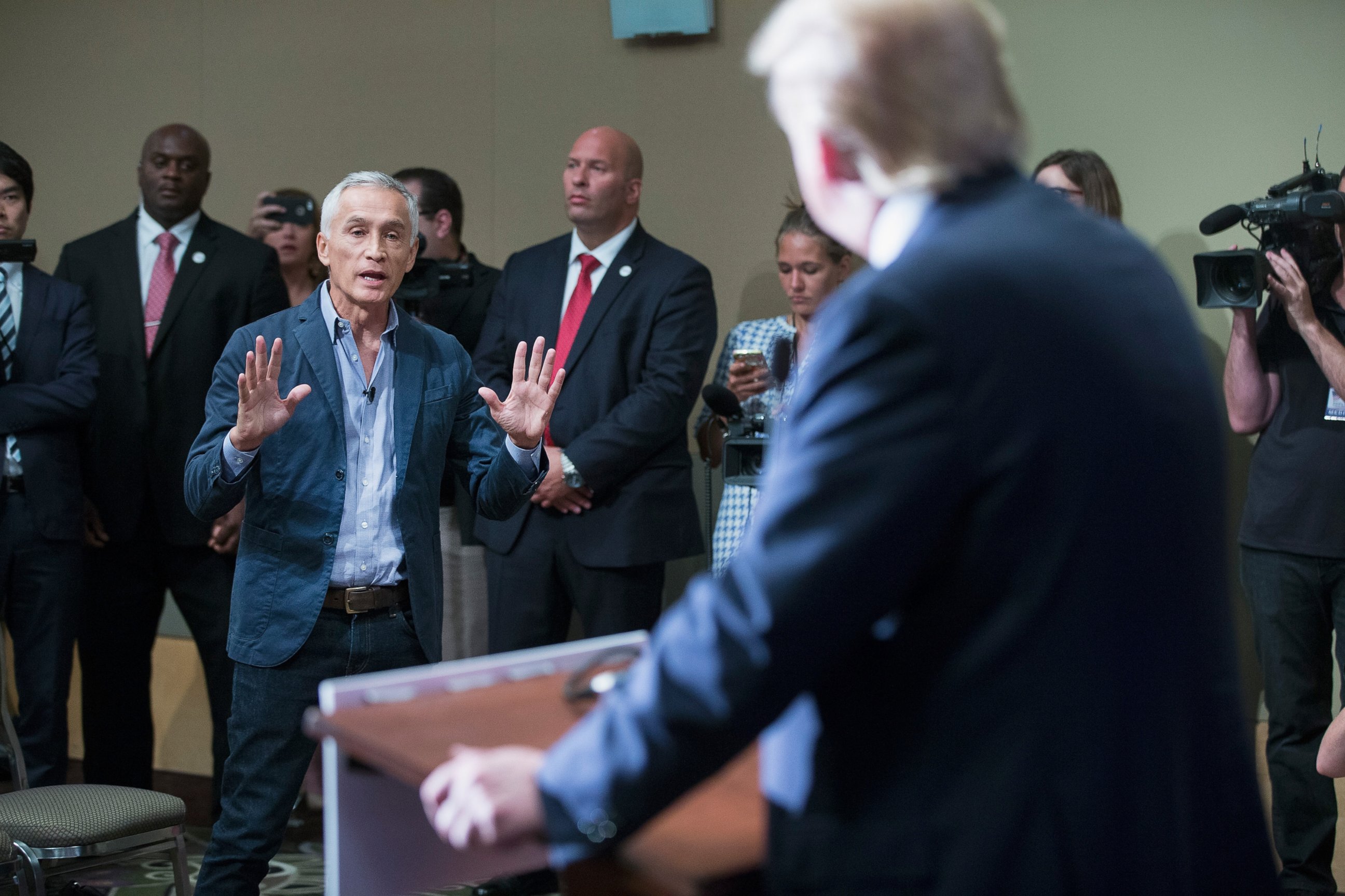 PHOTO: Donald Trump fields a question from Univision and Fusion anchor Jorge Ramos during a press conference held before his campaign event at the Grand River Center, Aug. 25, 2015, in Dubuque, Iowa.