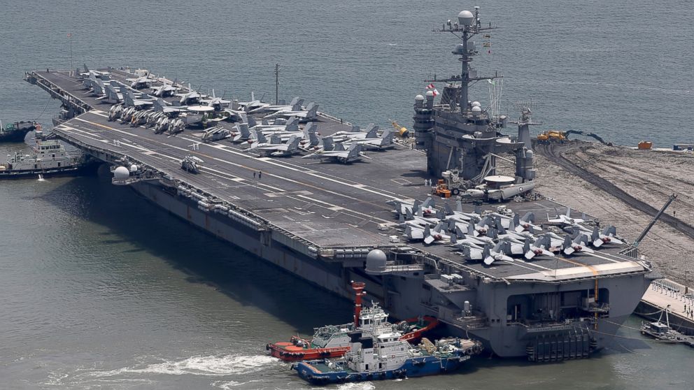 US aircraft carrier USS George Washington sits at anchor in Busan port, July 11, 2014, in Busan, South Korea. 