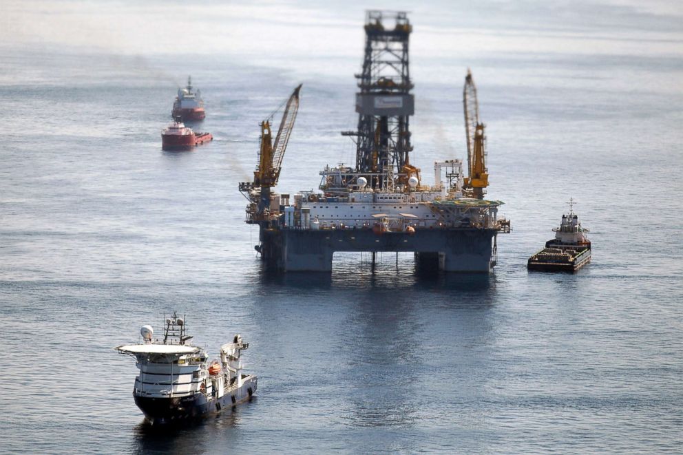 PHOTO: Ships work near the site of the BP Deepwater Horizon oil spill on August 3, 2010, in the Gulf of Mexico off the coast of Louisiana.  