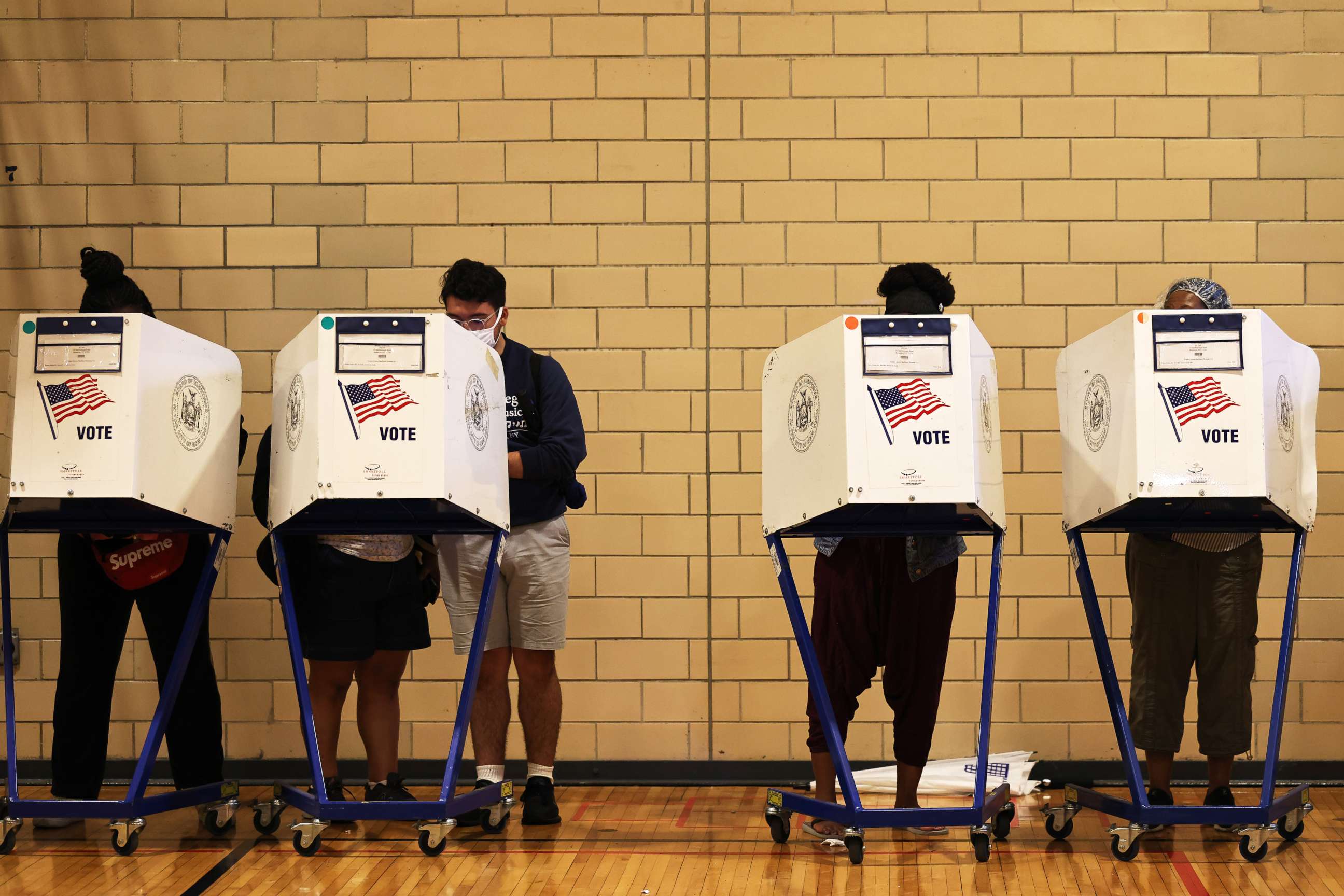 PHOTO: In this June 22, 2021, file photo, people vote during the primary election in Brooklyn, N.Y.
