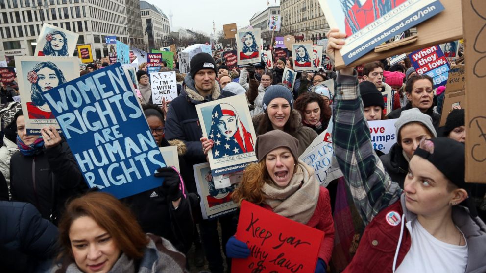 Women participants demonstrate in front of the United States Embassy and Brandenburg Gate one day after the inauguration of U.S. President Donald Trump, Jan. 21, 2017, in Berlin, Germany. 