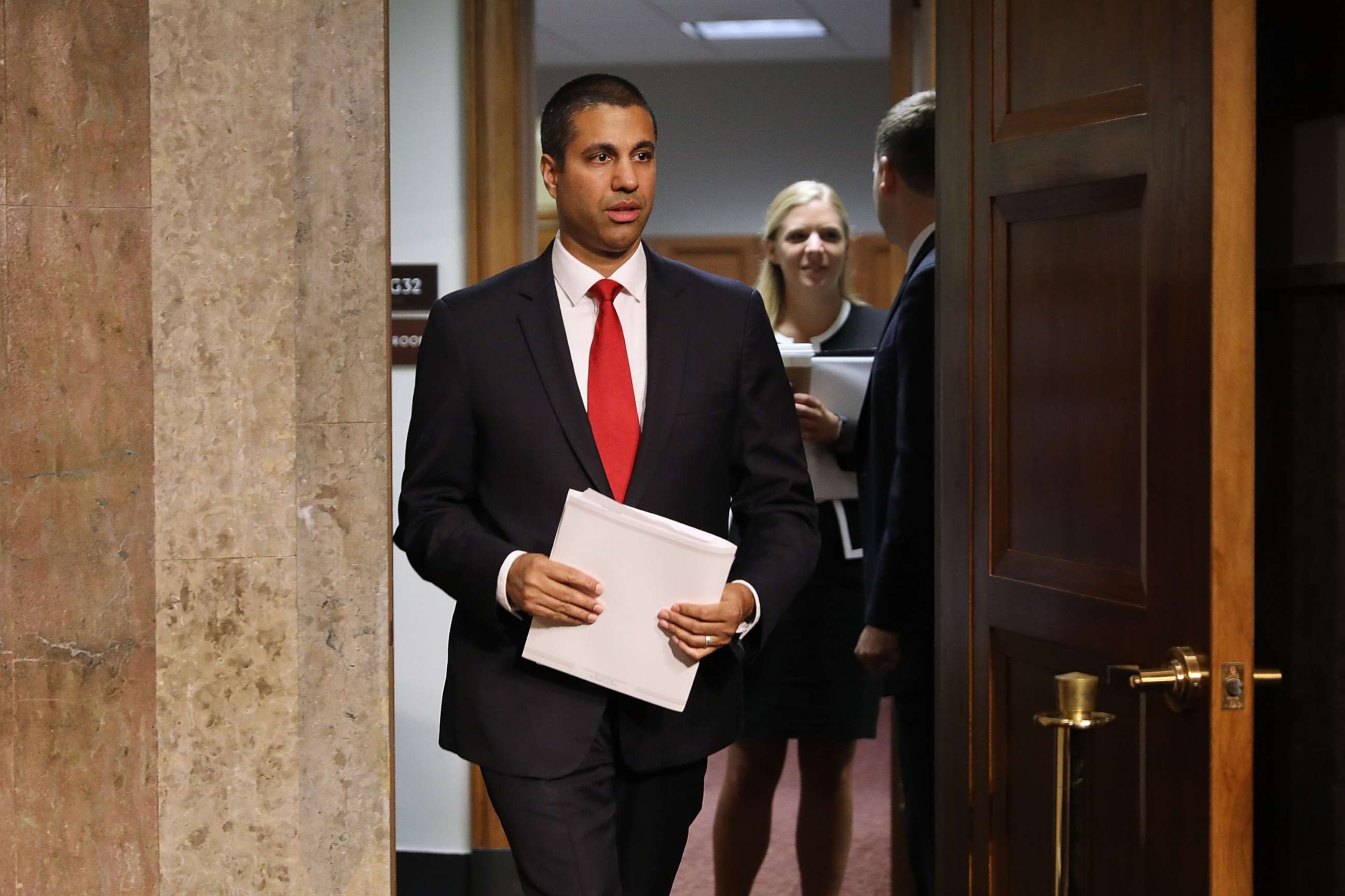 PHOTO: FCC Chairman Ajit Pai arrives for a confirmation hearing at the Dirksen Senate Office Building on Capitol Hill July 19, 2017 in Washington.