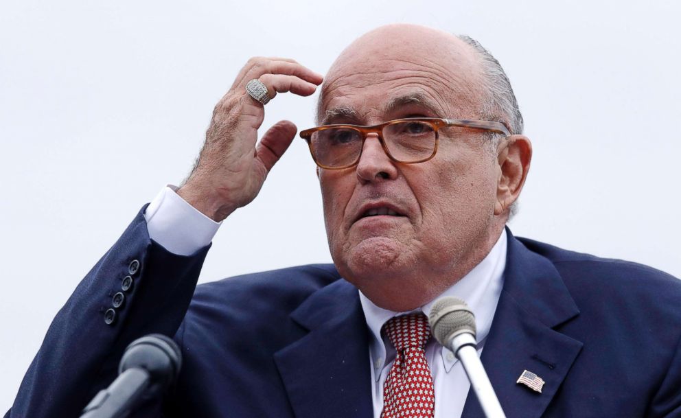 PHOTO: Rudy Giuliani, an attorney for President Donald Trump, addresses a gathering during a campaign event for Eddie Edwards, who is running for the U.S. Congress, in Portsmouth, N.H., Aug. 1, 2018. 